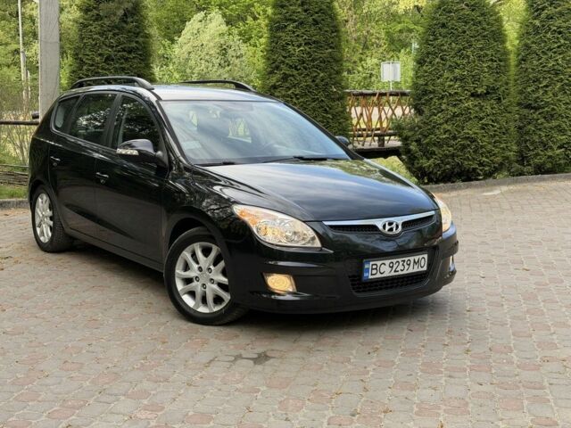 Черный Хендай i30, объемом двигателя 1.6 л и пробегом 270 тыс. км за 4950 $, фото 1 на Automoto.ua
