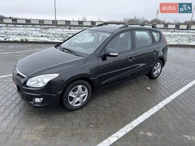 Черный Хендай i30, объемом двигателя 1.6 л и пробегом 169 тыс. км за 6150 $, фото 1 на Automoto.ua