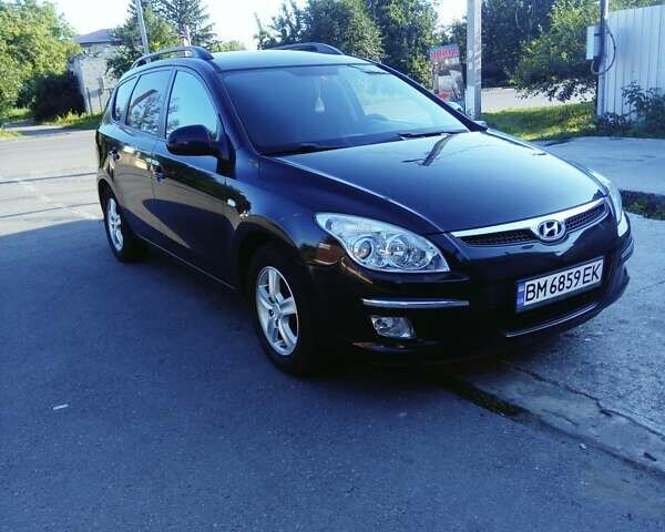 Черный Хендай i30, объемом двигателя 1.6 л и пробегом 232 тыс. км за 6600 $, фото 1 на Automoto.ua