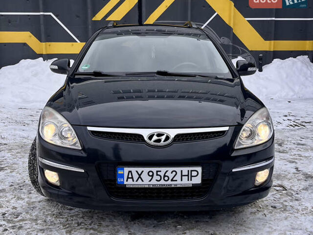 Черный Хендай i30, объемом двигателя 1.6 л и пробегом 234 тыс. км за 6000 $, фото 1 на Automoto.ua