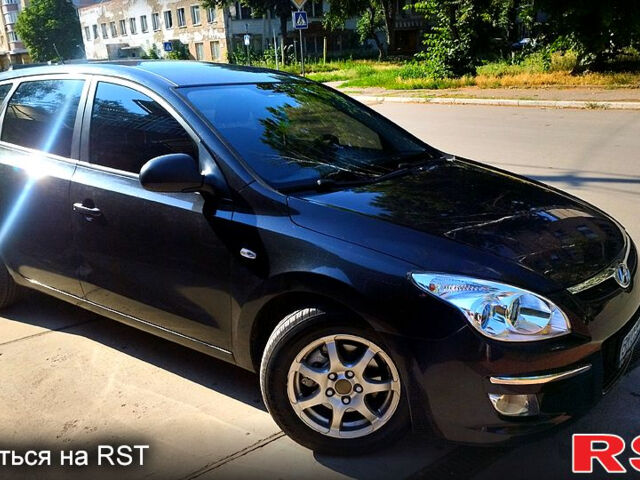 Чорний Хендай i30, об'ємом двигуна 1.6 л та пробігом 207 тис. км за 6450 $, фото 1 на Automoto.ua