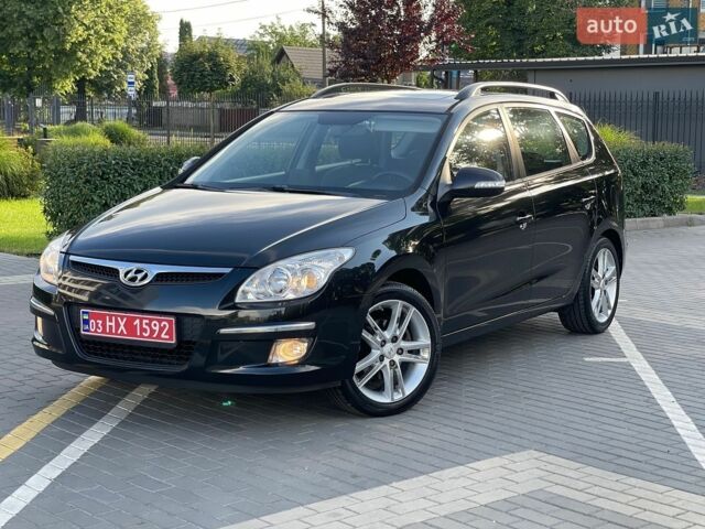 Чорний Хендай i30, об'ємом двигуна 1.6 л та пробігом 175 тис. км за 7700 $, фото 1 на Automoto.ua