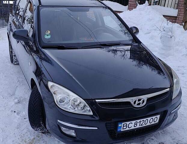 Черный Хендай i30, объемом двигателя 1.6 л и пробегом 341 тыс. км за 5800 $, фото 1 на Automoto.ua