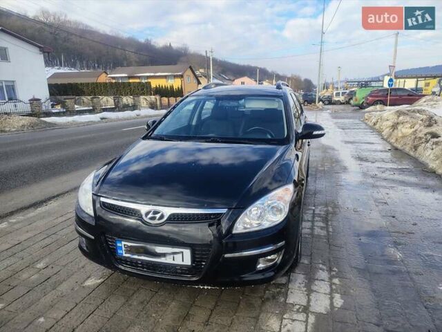 Черный Хендай i30, объемом двигателя 1.6 л и пробегом 239 тыс. км за 5000 $, фото 1 на Automoto.ua