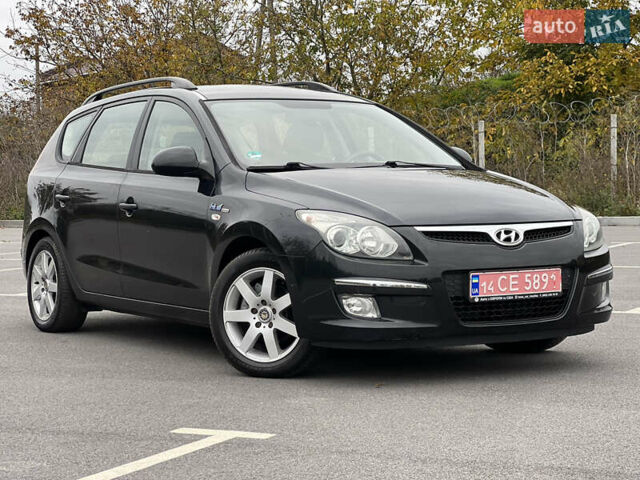 Чорний Хендай i30, об'ємом двигуна 1.6 л та пробігом 188 тис. км за 6450 $, фото 1 на Automoto.ua