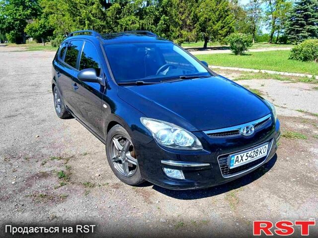 Черный Хендай i30, объемом двигателя 1.4 л и пробегом 208 тыс. км за 5799 $, фото 1 на Automoto.ua