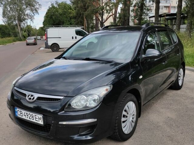 Черный Хендай i30, объемом двигателя 1.4 л и пробегом 220 тыс. км за 6100 $, фото 1 на Automoto.ua