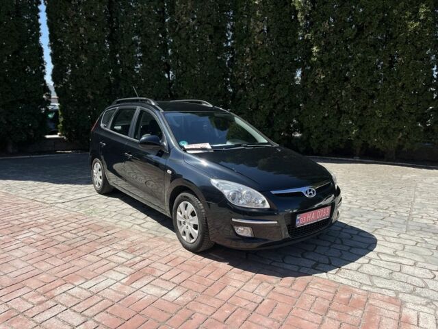 Черный Хендай i30, объемом двигателя 1.6 л и пробегом 230 тыс. км за 6800 $, фото 1 на Automoto.ua