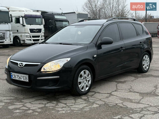 Черный Хендай i30, объемом двигателя 1.6 л и пробегом 265 тыс. км за 5900 $, фото 1 на Automoto.ua