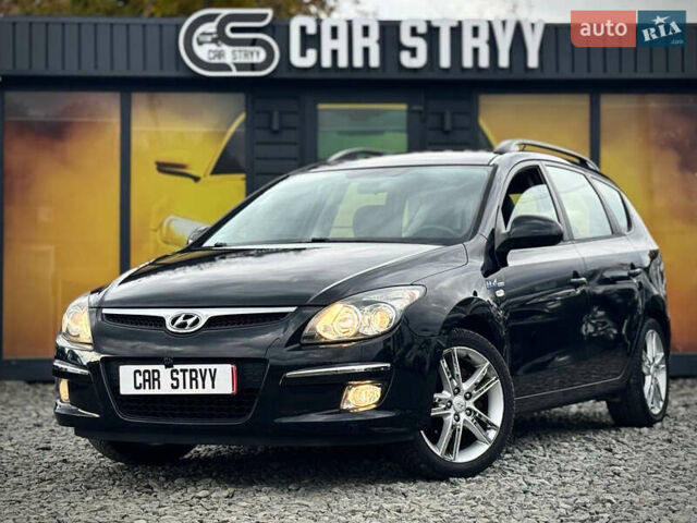 Черный Хендай i30, объемом двигателя 1.6 л и пробегом 187 тыс. км за 6900 $, фото 1 на Automoto.ua