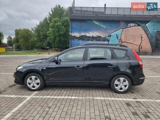 Черный Хендай i30, объемом двигателя 1.6 л и пробегом 128 тыс. км за 7700 $, фото 1 на Automoto.ua
