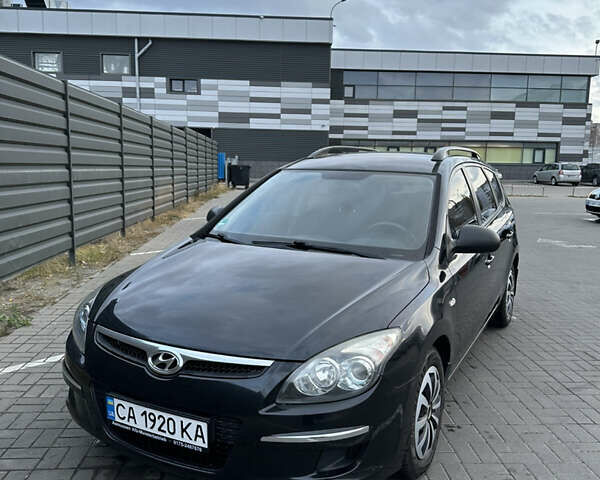 Черный Хендай i30, объемом двигателя 1.58 л и пробегом 240 тыс. км за 5200 $, фото 1 на Automoto.ua