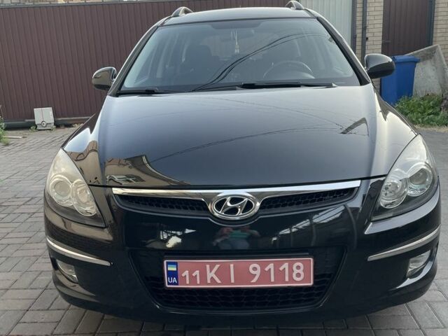 Чорний Хендай i30, об'ємом двигуна 1.4 л та пробігом 217 тис. км за 5500 $, фото 1 на Automoto.ua