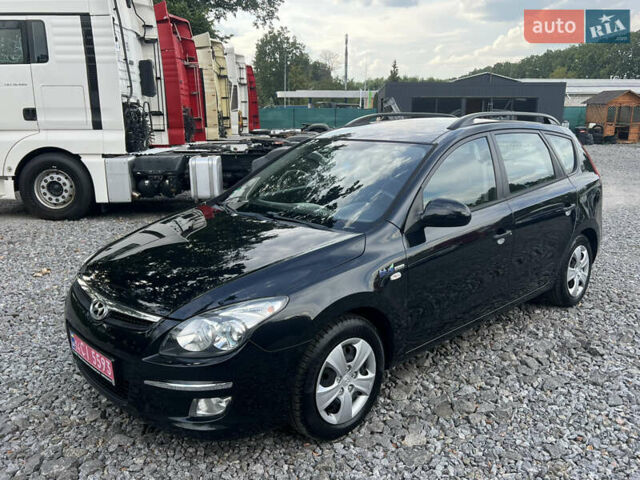 Чорний Хендай i30, об'ємом двигуна 1.4 л та пробігом 188 тис. км за 6850 $, фото 1 на Automoto.ua