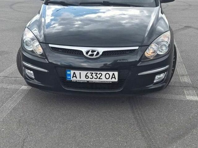 Черный Хендай i30, объемом двигателя 1.6 л и пробегом 193 тыс. км за 7500 $, фото 1 на Automoto.ua