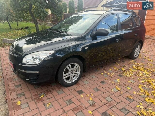 Черный Хендай i30, объемом двигателя 1.6 л и пробегом 257 тыс. км за 5700 $, фото 1 на Automoto.ua
