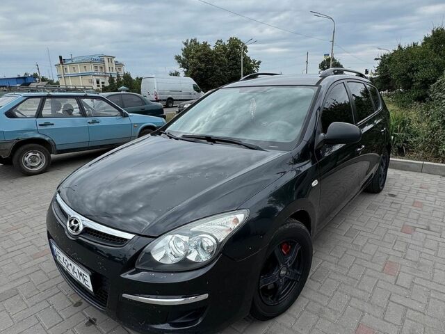 Чорний Хендай i30, об'ємом двигуна 1.6 л та пробігом 342 тис. км за 5800 $, фото 1 на Automoto.ua