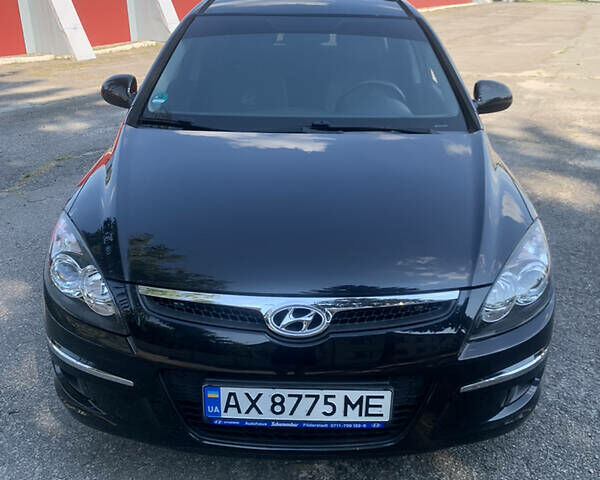 Черный Хендай i30, объемом двигателя 1.4 л и пробегом 92 тыс. км за 5800 $, фото 1 на Automoto.ua