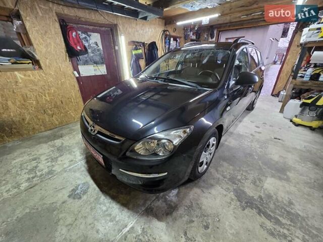 Чорний Хендай i30, об'ємом двигуна 1.6 л та пробігом 231 тис. км за 5600 $, фото 1 на Automoto.ua