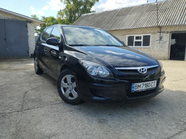 Черный Хендай i30, объемом двигателя 1.4 л и пробегом 163 тыс. км за 5800 $, фото 1 на Automoto.ua
