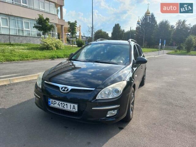 Черный Хендай i30, объемом двигателя 1.58 л и пробегом 203 тыс. км за 5700 $, фото 1 на Automoto.ua