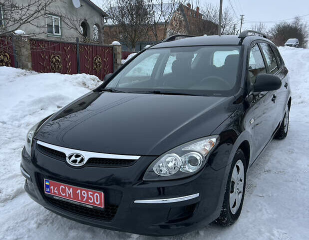 Чорний Хендай i30, об'ємом двигуна 1.4 л та пробігом 144 тис. км за 5800 $, фото 1 на Automoto.ua