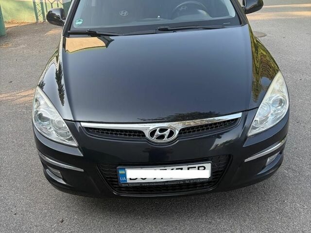Черный Хендай i30, объемом двигателя 1.6 л и пробегом 276 тыс. км за 5400 $, фото 1 на Automoto.ua
