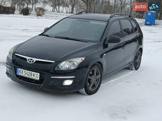 Чорний Хендай i30, об'ємом двигуна 1.4 л та пробігом 210 тис. км за 5999 $, фото 1 на Automoto.ua