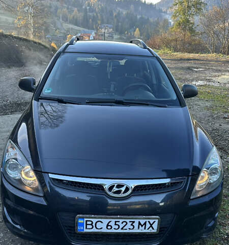 Черный Хендай i30, объемом двигателя 1.58 л и пробегом 243 тыс. км за 5500 $, фото 1 на Automoto.ua