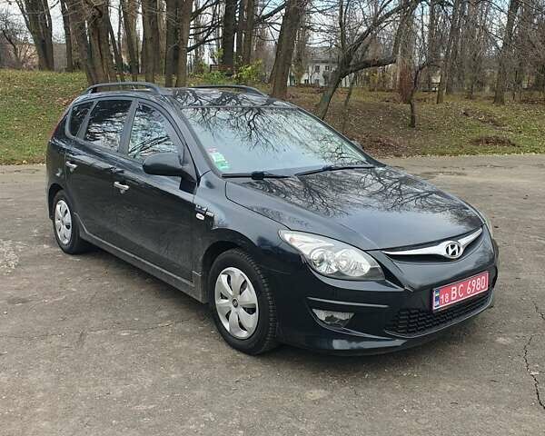Чорний Хендай i30, об'ємом двигуна 1.4 л та пробігом 149 тис. км за 6100 $, фото 1 на Automoto.ua