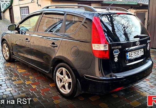 Черный Хендай i30, объемом двигателя 1.6 л и пробегом 212 тыс. км за 5800 $, фото 1 на Automoto.ua