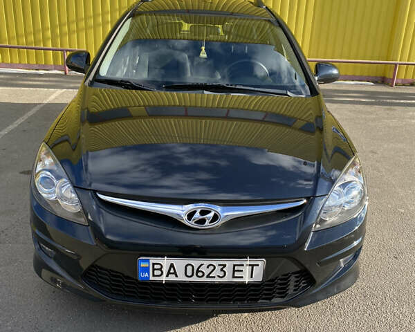 Черный Хендай i30, объемом двигателя 1.4 л и пробегом 187 тыс. км за 6850 $, фото 1 на Automoto.ua