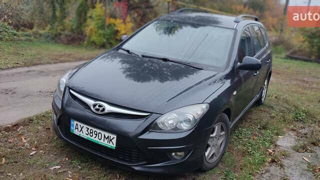 Черный Хендай i30, объемом двигателя 1.4 л и пробегом 216 тыс. км за 5650 $, фото 1 на Automoto.ua