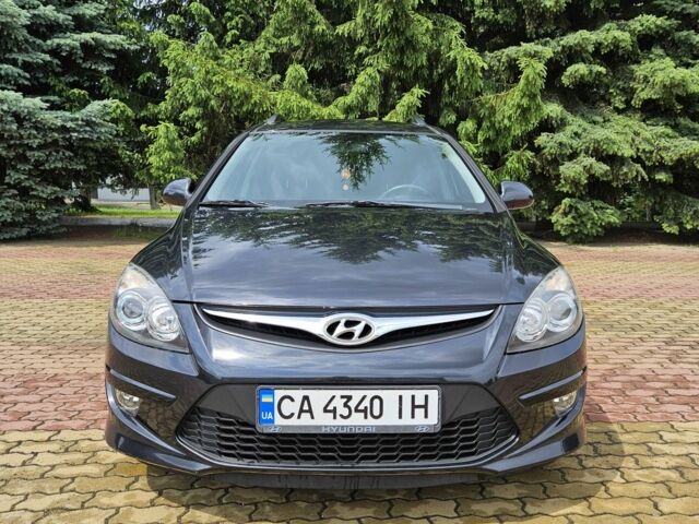 Черный Хендай i30, объемом двигателя 1.4 л и пробегом 157 тыс. км за 6700 $, фото 1 на Automoto.ua