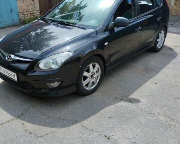Чорний Хендай i30, об'ємом двигуна 1.4 л та пробігом 176 тис. км за 5700 $, фото 1 на Automoto.ua