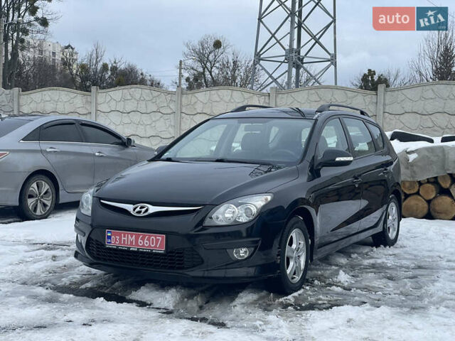 Черный Хендай i30, объемом двигателя 1.6 л и пробегом 204 тыс. км за 6600 $, фото 1 на Automoto.ua
