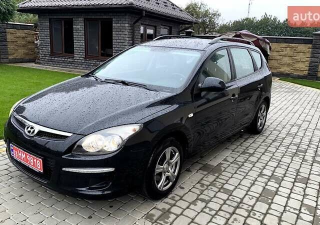 Черный Хендай i30, объемом двигателя 1.4 л и пробегом 145 тыс. км за 5999 $, фото 1 на Automoto.ua