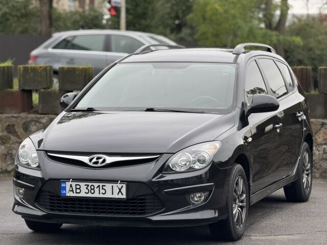Черный Хендай i30, объемом двигателя 1.6 л и пробегом 65 тыс. км за 6999 $, фото 1 на Automoto.ua