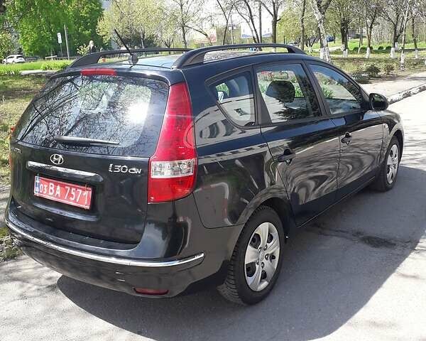 Чорний Хендай i30, об'ємом двигуна 1.4 л та пробігом 182 тис. км за 6750 $, фото 1 на Automoto.ua