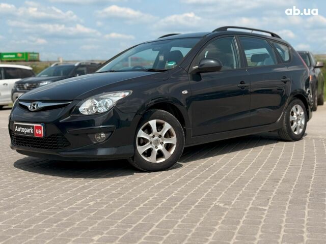 Черный Хендай i30, объемом двигателя 1.4 л и пробегом 223 тыс. км за 5990 $, фото 1 на Automoto.ua