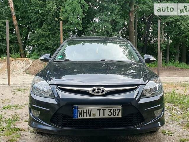 Чорний Хендай i30, об'ємом двигуна 1.6 л та пробігом 233 тис. км за 6700 $, фото 1 на Automoto.ua