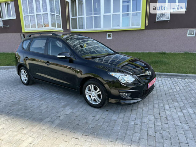 Черный Хендай i30, объемом двигателя 1.6 л и пробегом 105 тыс. км за 9500 $, фото 1 на Automoto.ua