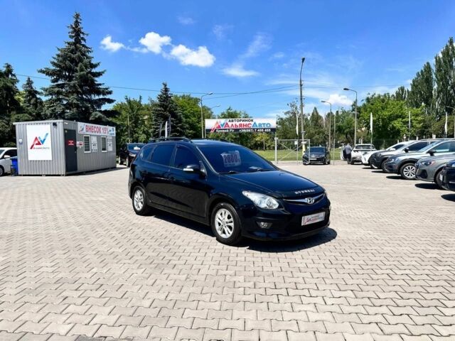 Черный Хендай i30, объемом двигателя 1.6 л и пробегом 195 тыс. км за 6200 $, фото 1 на Automoto.ua