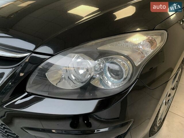 Черный Хендай i30, объемом двигателя 1.6 л и пробегом 205 тыс. км за 6700 $, фото 1 на Automoto.ua
