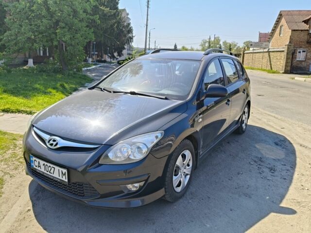 Черный Хендай i30, объемом двигателя 1.4 л и пробегом 222 тыс. км за 5555 $, фото 1 на Automoto.ua