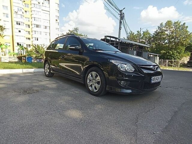 Черный Хендай i30, объемом двигателя 1.6 л и пробегом 196 тыс. км за 6199 $, фото 1 на Automoto.ua