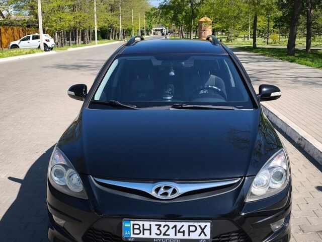 Черный Хендай i30, объемом двигателя 1.58 л и пробегом 243 тыс. км за 7500 $, фото 1 на Automoto.ua