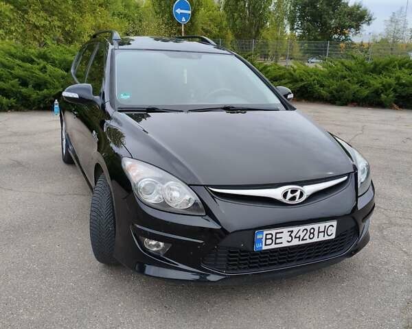 Черный Хендай i30, объемом двигателя 1.4 л и пробегом 137 тыс. км за 7500 $, фото 1 на Automoto.ua