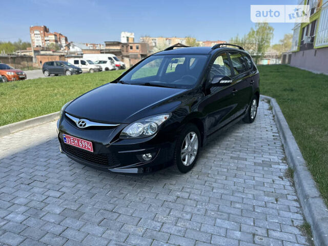 Чорний Хендай i30, об'ємом двигуна 1.6 л та пробігом 105 тис. км за 9500 $, фото 1 на Automoto.ua