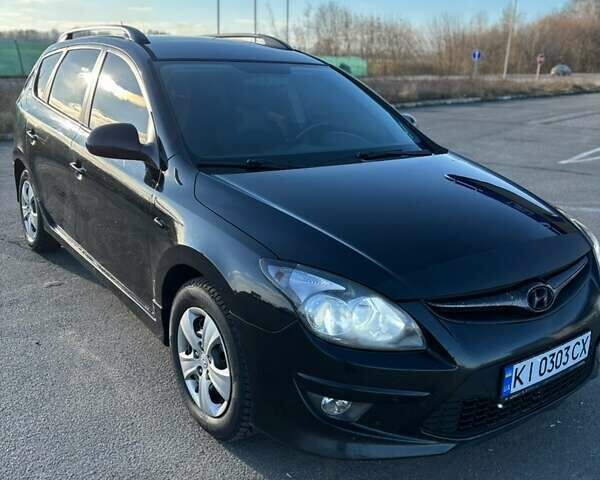 Чорний Хендай i30, об'ємом двигуна 1.6 л та пробігом 255 тис. км за 6500 $, фото 1 на Automoto.ua